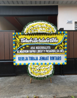 Papan Bunga Duka di Buti